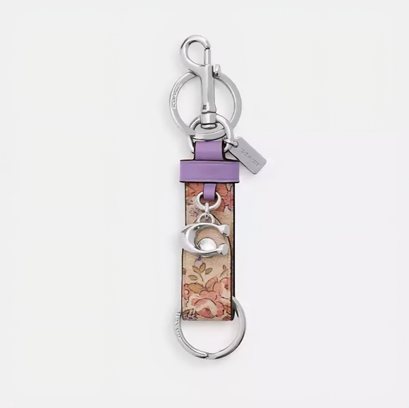 Coach trigger snap bag charm
